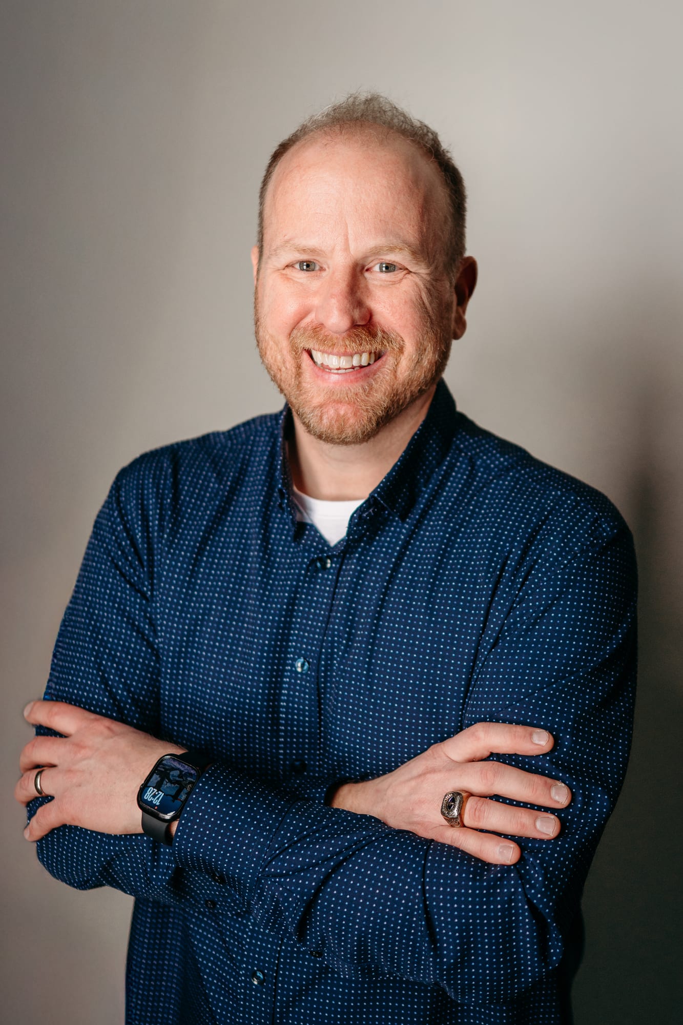 Joshua P. Underbakke speaking with Bible in hand